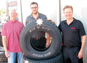 Kevin Brooks, left, has sold a string of nine Big O Tires stores in Western Colorado he operated with his wife, Valerie, to Matt Greco, center, and Rob Curry. With the purchase, Greco and Curry now own 26 stores, the largest group in the Big O Tires network. (Business Times photo by Phil Castle)