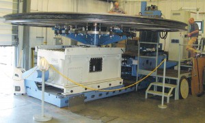 Workers at Leitner-Poma in Grand Junction machine a bull wheel, a component of a new gondola that will be installed at the Royal Gorge attraction near Canon City. The company designs and manufactures a variety of cable transportation systems for ski resorts as well as specialty and public transportation projects. (Business Times photo by Phil Castle) 
