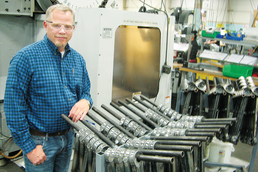 Manufacturing success: Firm and VP honored for advancing industry